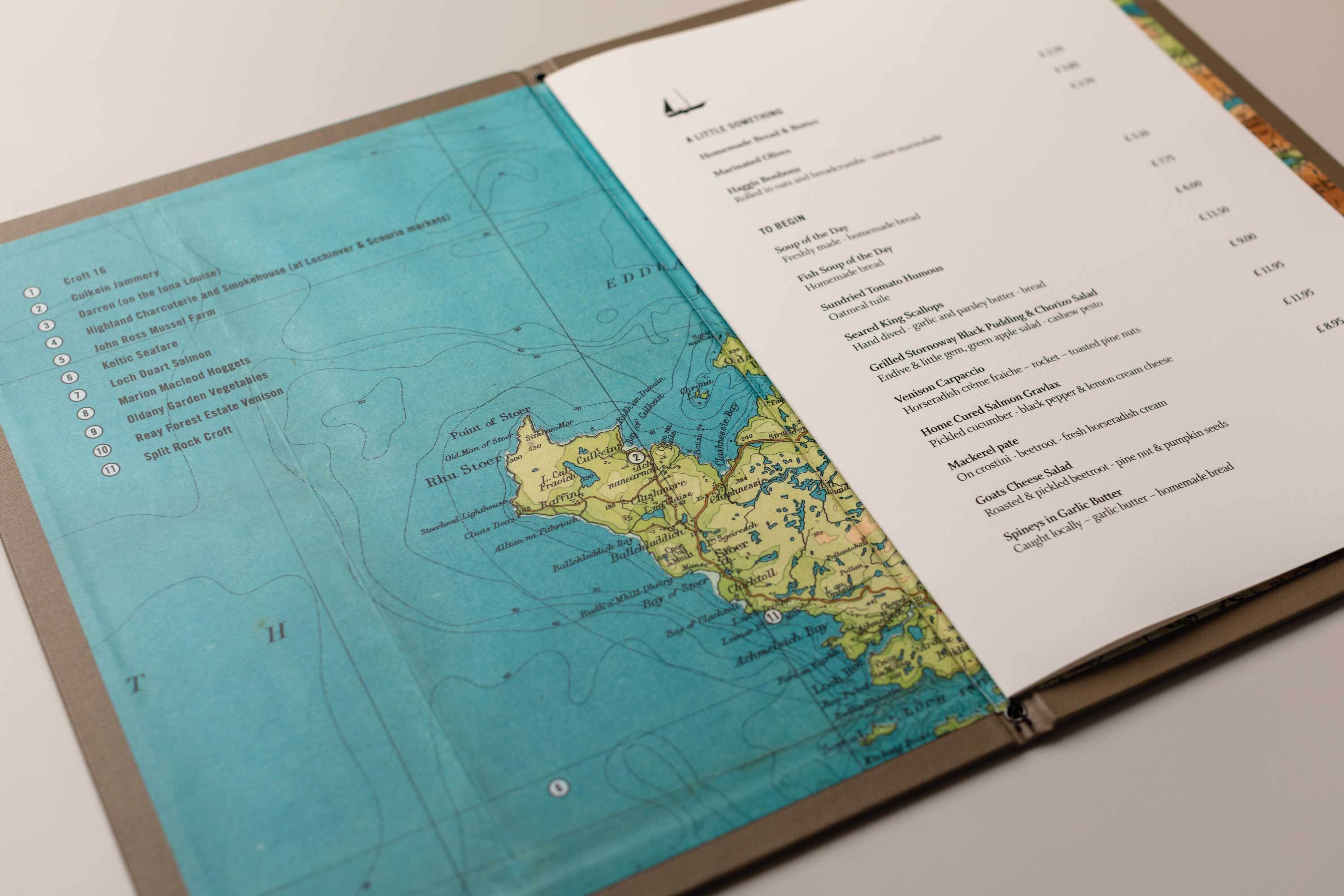Close-up of map on inside cover and front page of Kylesku menu.