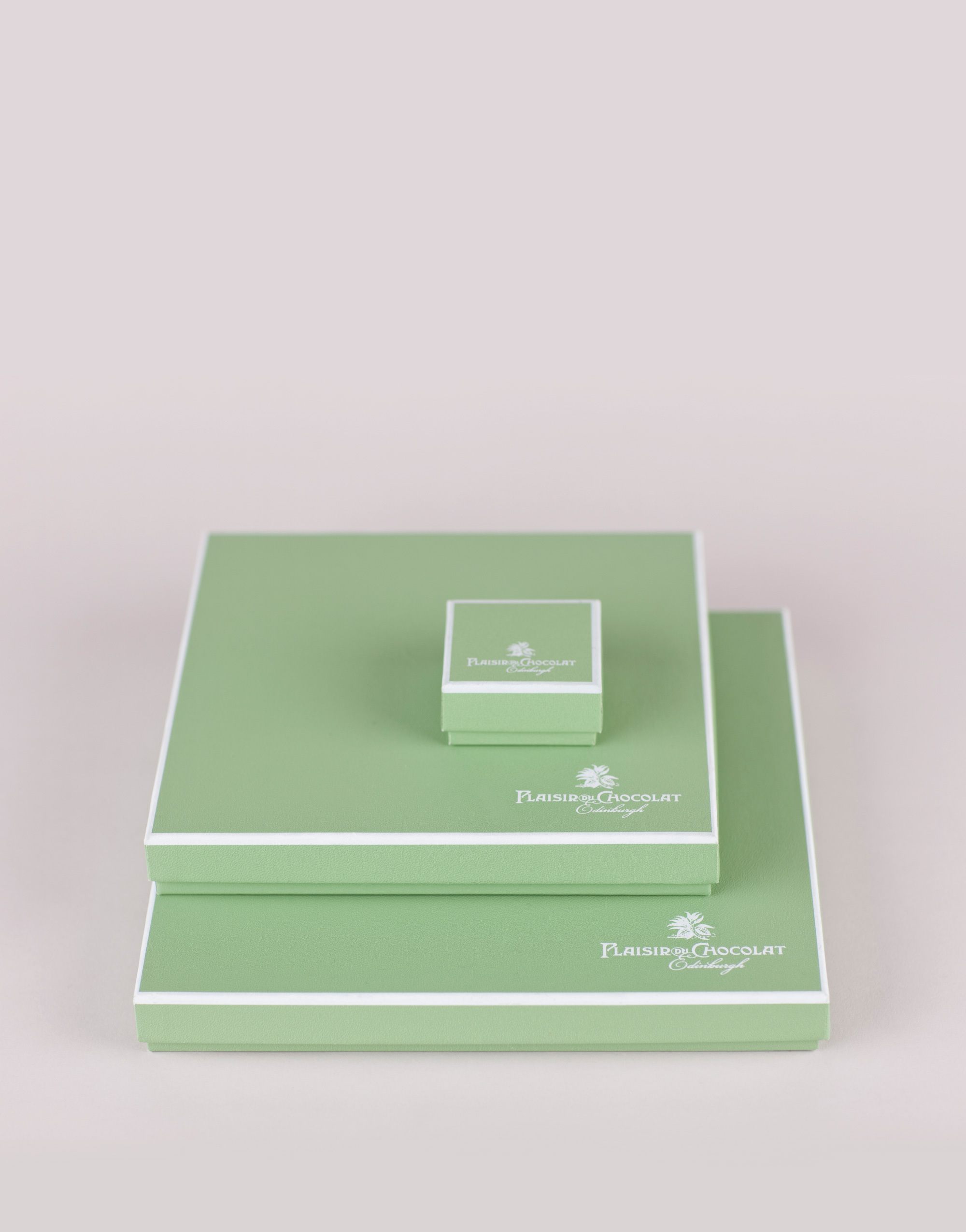 3 Plaisir du Chocolat square based, green and white chocolate boxes