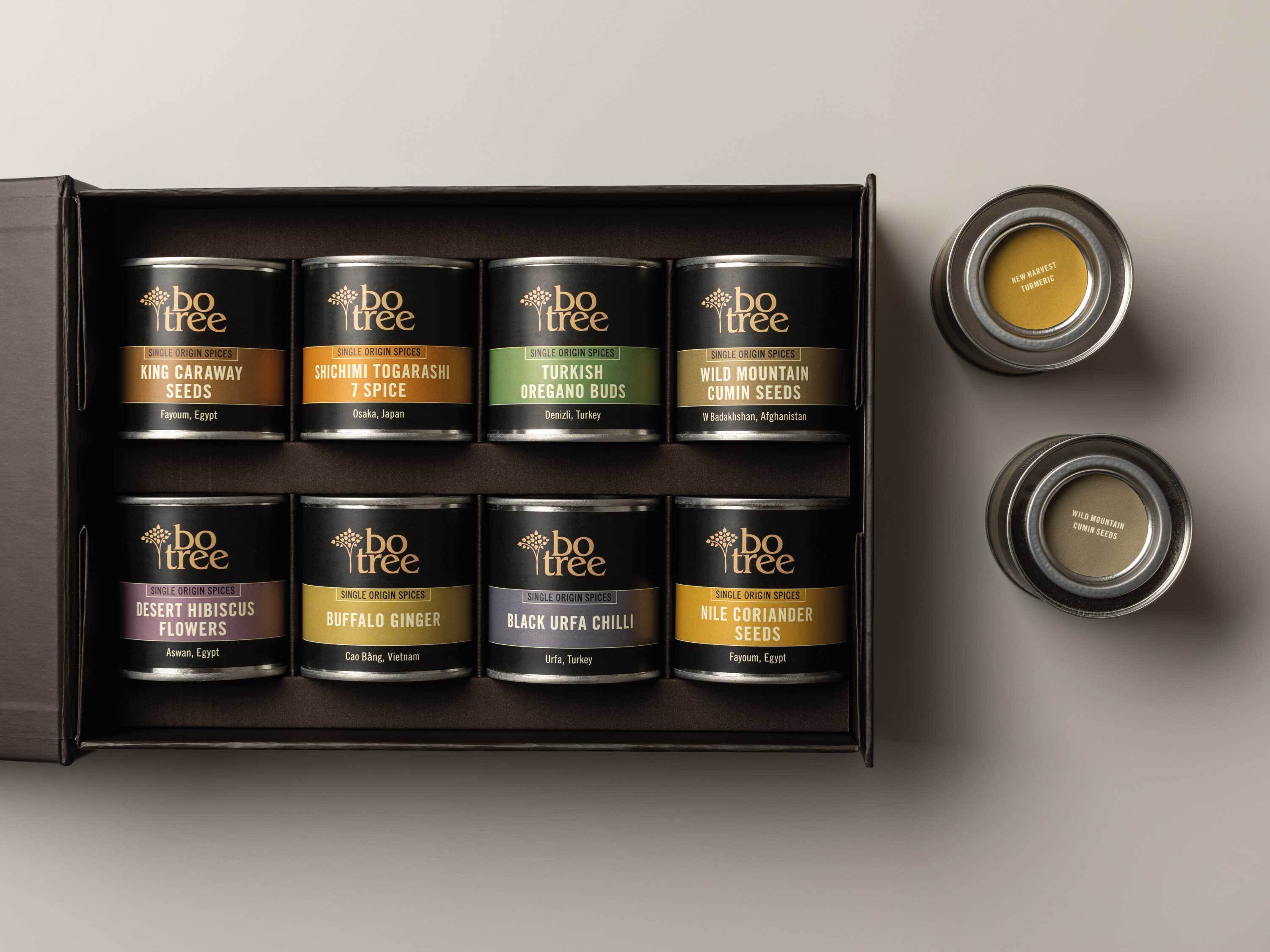Brown Botree gift box containing 8 single-source spice tins and 2 further tins.